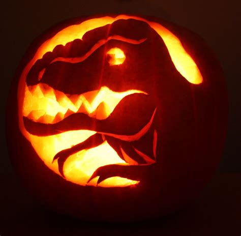 T rex pumpkin carving - Are you ready to take your pumpkin carving skills to the next level? Look no further than downloadable pumpkin stencils. These handy templates provide a wide range of designs that ...